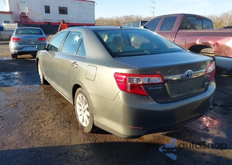 2013 Toyota Camry Hybrid Xle z USA, uszkodzony, nr VIN 4T1BD1FKXDU079411